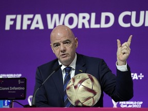 FILE FIFA President Gianni Infantino meets the media at the FIFA World Cup closing press conference in Doha, Qatar, Friday, Dec. 16, 2022.. An advertising regulator says FIFA made false claims about last year's World Cup in Qatar being carbon neutral. The Swiss Commission for Fairness says FIFA was "not able to provide proof that the claims were accurate."