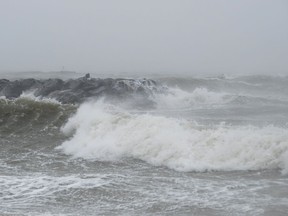 Waves crash at Outlook Beach in Hampton, Va.