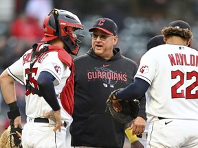 FILE - Cleveland Guardians manager Terry Francona makes a pitching change during the seventh inning of a baseball game against the Detroit Tigers, May 9, 2023, in Cleveland. Francona will not be with the team Wednesday, June 28, for a second straight game after being hospitalized when he felt poorly before a series opener against the Kansas City Royals.