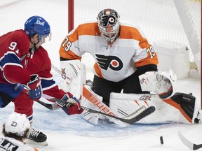Montreal Canadiens' Sean Monahan (91) moves in on Philadelphia Flyers' goaltender Carter Hart during second period NHL hockey action in Montreal, Saturday, November 19, 2022. The Canadiens signed veteran centre Monahan to a one-year, US$1.985-million contract extension, the club announced Tuesday.THE CANADIAN PRESS/Graham Hughes