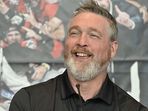 Quebec Remparts general manager and coach Patrick Roy reacts at a news conference as he announces his retirement from junior hockey, Tuesday, June 13, 2023 at the Videotron Centre in Quebec City.