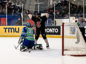 Toronto Six defender Kati Tabin celebrates a goal in front of Connecticut Whales goalie Abbie Ives (35) during PHL playoff action in Toronto in a March 18, 2023, handout photo.
