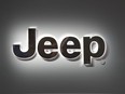 This Jan. 14, 2019 photo shows a Jeep logo at the North American International Auto Show in Detroit. Stellantis is recalling more than 354,000 Jeeps worldwide, Tuesday, June 13, 2023, because the rear coil springs can fall off while they're being driven. The recall covers certain 2022 and 2023 Grand Cherokee and 2021 to 2023 Grand Cherokee L SUVs.