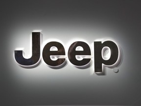 This Jan. 14, 2019 photo shows a Jeep logo at the North American International Auto Show in Detroit. Stellantis is recalling more than 354,000 Jeeps worldwide, Tuesday, June 13, 2023, because the rear coil springs can fall off while they're being driven. The recall covers certain 2022 and 2023 Grand Cherokee and 2021 to 2023 Grand Cherokee L SUVs.