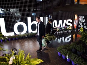 A man leaves a Loblaws store in Toronto on Thursday, May 3, 2018