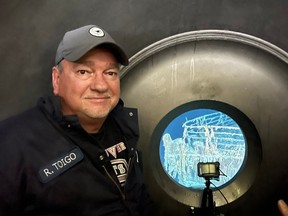 Ron Toigo aboard the Titan submersible last year, with the bow of the Titanic visible out the mini-sub's porthole.