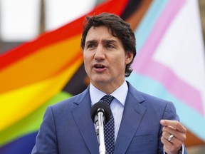 Prime Minister Justin Trudeau takes part in a Pride flag raising