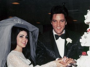 Elvis Presley and Priscilla are pictured at their wedding in 1967.
