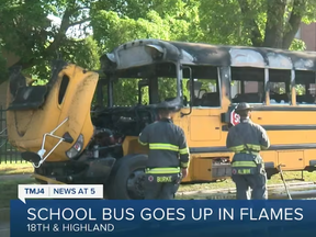 A fire ripped through a school bus in Milwaukee shortly after driver Imunek Williams evacuated students.