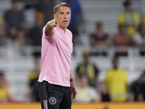 Canada coach John Herdman has called on some veteran help from former Intern Miami CF coach Phil Neville for his team's push for a trophy in the CONCACAF Nations League finals. Neville is shown in this May 17, 2023 file photo.