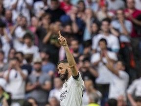 Real Madrid's Karim Benzema celebrates after scoring during the Spanish La Liga soccer match against Athletic Bilbao at the Santiago Bernabeu stadium in Madrid, Sunday, June 4, 2023.