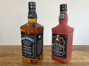 Jack Daniel's is displayed next to a Bad Spaniels dog toy