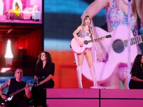 Taylor Swift is pictured performing in Detroit during her The Eras tour
