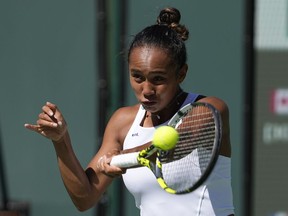 Leylah Fernandez returns to Caroline Garcia, of France, at the BNP Paribas Open tennis tournament Monday, March 13, 2023, in Indian Wells, Calif. Fernandez rolled to a 6-0, 6-1 victory over Germany's Lena Papadakis in first-round play Monday at the Bad Homburg Open.