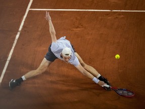 Canada's Denis Shapovalov plays a shot against Spain's Carlos Alcaraz during their third round match of the French Open tennis tournament at the Roland Garros stadium in Paris, Friday, June 2, 2023. Shapovalov defeated South Africa's Lloyd Harris 7-6 (1), 6-4 in first-round play Monday at the Terra Wortmann Open.