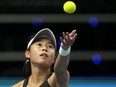 Carol Zhao of Canada serves a ball to Russia's Daria Kaasatkina during their group A Billie Jean King Cup finals tennis match in Prague, Czech Republic, Tuesday, Nov. 2, 2021. Zhao beat Britain's Emily Appleton 4-6, 7-6, 6-4 in the first round of qualifying play at Wimbledon.