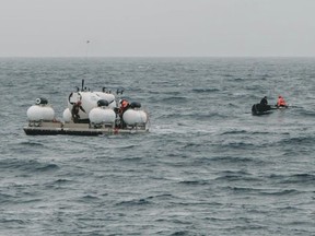 In this image released by Action Aviation, the submersible Titan is prepared for a dive into a remote area of the Atlantic Ocean on an expedition to the Titanic on Sunday, June 18, 2023.