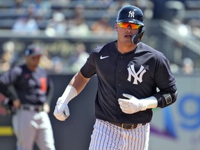 FILE - New York Yankees' Josh Donaldson runs the bases after his solo home run off Detroit Tigers pitcher Spencer Turnbull during the fourth inning of a spring training baseball game Tuesday, March 21, 2023, in Tampa, Fla. Donaldson will start a minor league injury rehabilitation assignment on Thursday, May 25, 2023, and slugger Giancarlo Stanton could begin one as soon as this weekend.