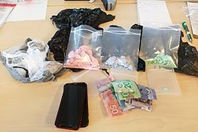 Substances and items that were seized by the Kingston Police on June 23, 2023 during the arrest of Moshe Samuels.