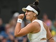 Bianca Andreescu reacts as she plays Tunisia's Ons Jabeur during their Wimbledon match.