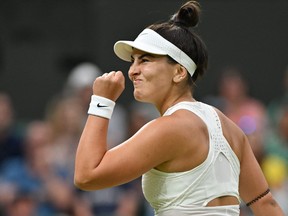 Bianca Andreescu reacts as she plays Tunisia's Ons Jabeur during their Wimbledon match.