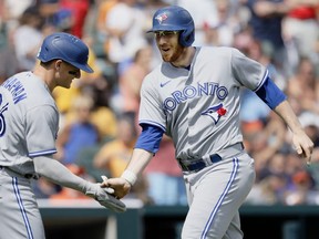 Danny Jansen of the Toronto Blue Jays celebrates his two-run home run against the Detroit Tigers.