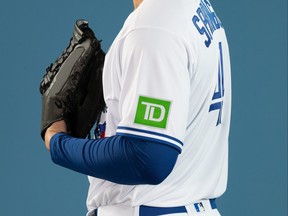 George Springer of the Toronto Blue Jays wears a jersey with a TD patch.
