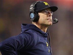 Head coach Jim Harbaugh of the Michigan Wolverines is seen on the sideline in 2022.