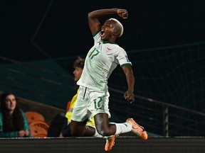 Zambia's Racheal Kundananji celebrates scoring her team's third goal against Costa Rica.