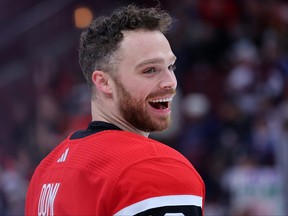 Max Domi warms up with the Chicago Blackhawks.