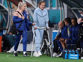 Keira Walsh of England returns to the bench with crutches during the FIFA Women's World Cup Australia & New Zealand 2023 Group D match between England and Denmark at Sydney Football Stadium on July 28, 2023 in Sydney, Australia. (Photo by Cameron Spencer/Getty Images)
