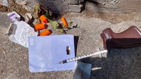 Used needles, which can infect people who come into contact with them, are a common occurrence near harm reduction sites.