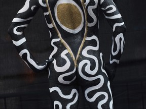 A model painted by an artist poses during Human Connection Arts Annual NYC Bodypainting Day in Union Square Park on Sunday, July 23, 2023, in New York.