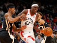 Raptors' Pascal Siakam drives against De'Andre Hunter of the Atlanta Hawks at State Farm Arena on January 20, 2020 in Atlanta.