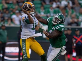 Edmonton Elks quarterback Taylor Cornelius (15) goes to throw the ball during the first half of CFL action at Mosaic Stadium on Thursday, July 6, 2023 in Regina.