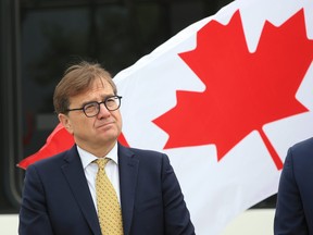 Jonathan Wilkinson, minister of natural resources, attends a federal government announcement of $325 million for electric buses for Calgary Transit on Monday, June 19, 2023.