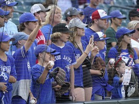 Toronto Blue Jays fans watch batting practice.