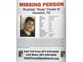 A missing poster for Rudolph "Rudy" Farias IV is shown during the Missing Person Day event