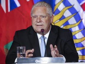 Doug Ford, premier of Ontario, speaks to media during the closing news conference at the Council of the Federation Canadian premiers meeting at The Fort Garry Hotel in Winnipeg, Wednesday, July 12, 2023.