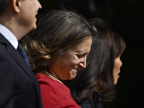 Francois-Philippe Champagne, left to right, Chrystia Freeland and Mary Ng arrive for a cabinet swearing-in ceremony at Rideau Hall in Ottawa on Wednesday, July 26, 2023.
