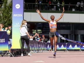 Senbere Teferi of Ethiopia breaks the Womens Only 5km World Record by 15s after winning in a time of 14m:29s in the ADIZERO: ROAD TO RECORDS Womens 5km at adidas HQ on September 12, 2021 in Herzogenaurach, Germany.