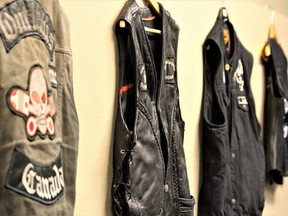 Police seized Outlaw motorcycle club vests as part of Project Derailleur, a seven-month investigation into an alleged biker-run drug trafficking ring in Southwestern Ontario. (Dale Carruthers/The London Free Press)