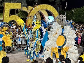 Some of the colourful costumes on display during a Junkanoo parade celebrating the 50th anniversary of independence in the Bahamas. (EDDIE CHAU/Toronto Sun)