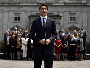 Prime Minister Justin Trudeau in front of members of his cabinet