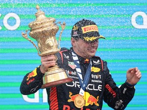 Race winner Max Verstappen of the Netherlands and Oracle Red Bull Racing celebrates on the podium