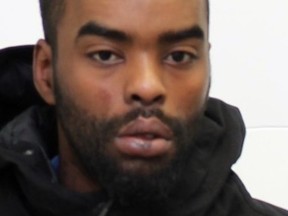 Mohammed Abdullahi is wanted for first degree murder after a man was found shot to death in a vehicle at a downtown Toronto parking lot.