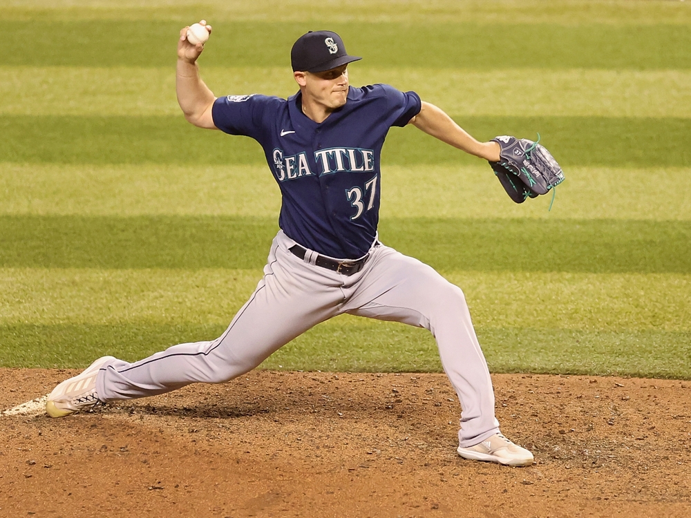 Andrew Chafin of the Arizona Diamondbacks delivers a pitch against News  Photo - Getty Images