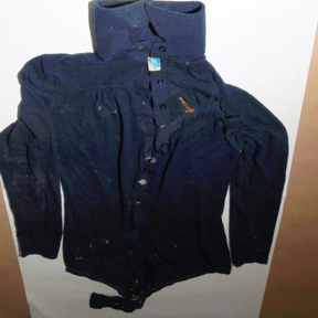 The coat she was wearing at the time of the murder. OPP