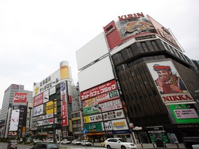 Buildings stand in the Susukino district of Sapporo City