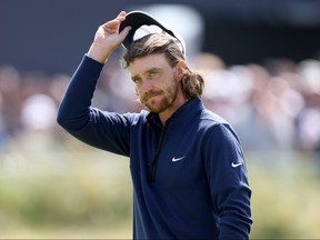 Tommy Fleetwood of England acknowledges the crowd on Day One of The 151st Open at Royal Liverpool Golf Club on July 20, 2023 in Hoylake, England.